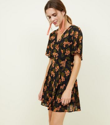 blue vanilla floral wrap dress