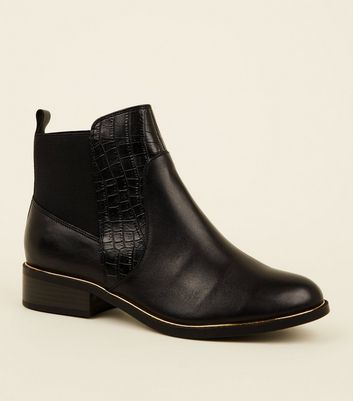 black metal trim chelsea boots