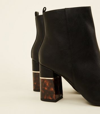 black ankle boots with tortoiseshell heel