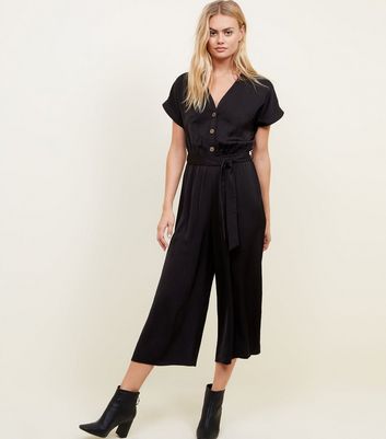 cropped jumpsuit with boots