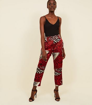 red animal print trousers