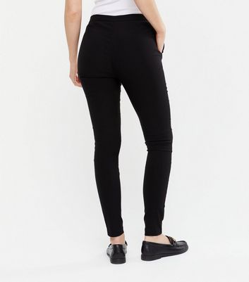 Damen Bekleidung Schwarze, schmale Hose aus Stretchmaterial mit Reißverschluss vorne Damen Bekleidung Schwarze, schmale Hose aus Stretchmaterial mit Reißverschluss vorne