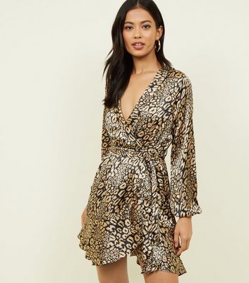 cream black and pink leopard print frill wrap dress