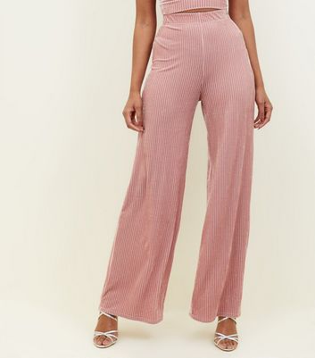 pink velvet trousers