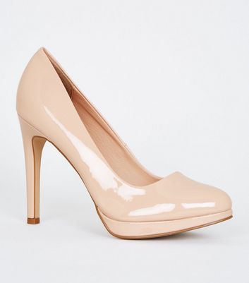 cream pointed stilettos