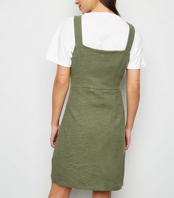khaki pinafore