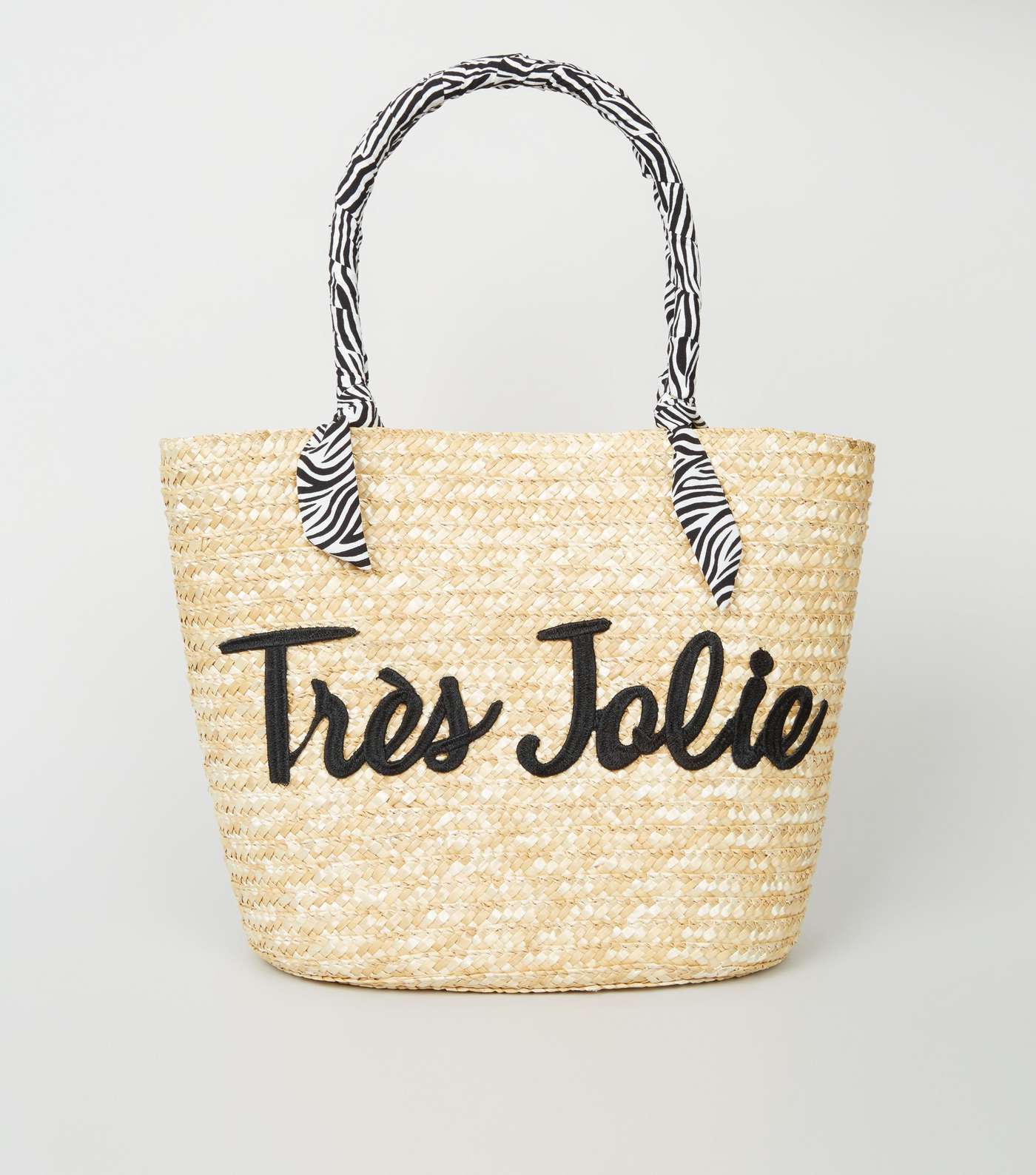 Stone Woven Straw Effect Trés Jolie Slogan Tote Bag