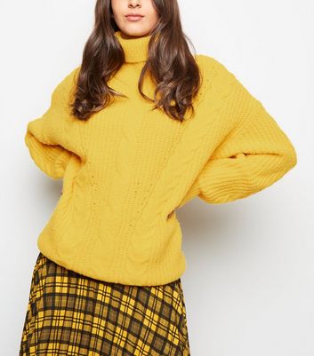 yellow polo neck jumper