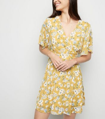 blue vanilla floral wrap dress