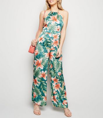 green halterneck jumpsuit