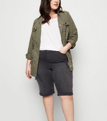 black ripped knee shorts
