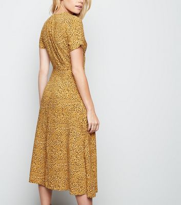 yellow leopard print midi dress