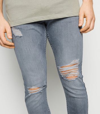 grey jeans ripped knee