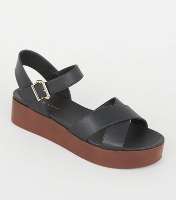 black leather flatforms