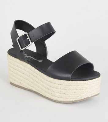 black wide fit flatforms