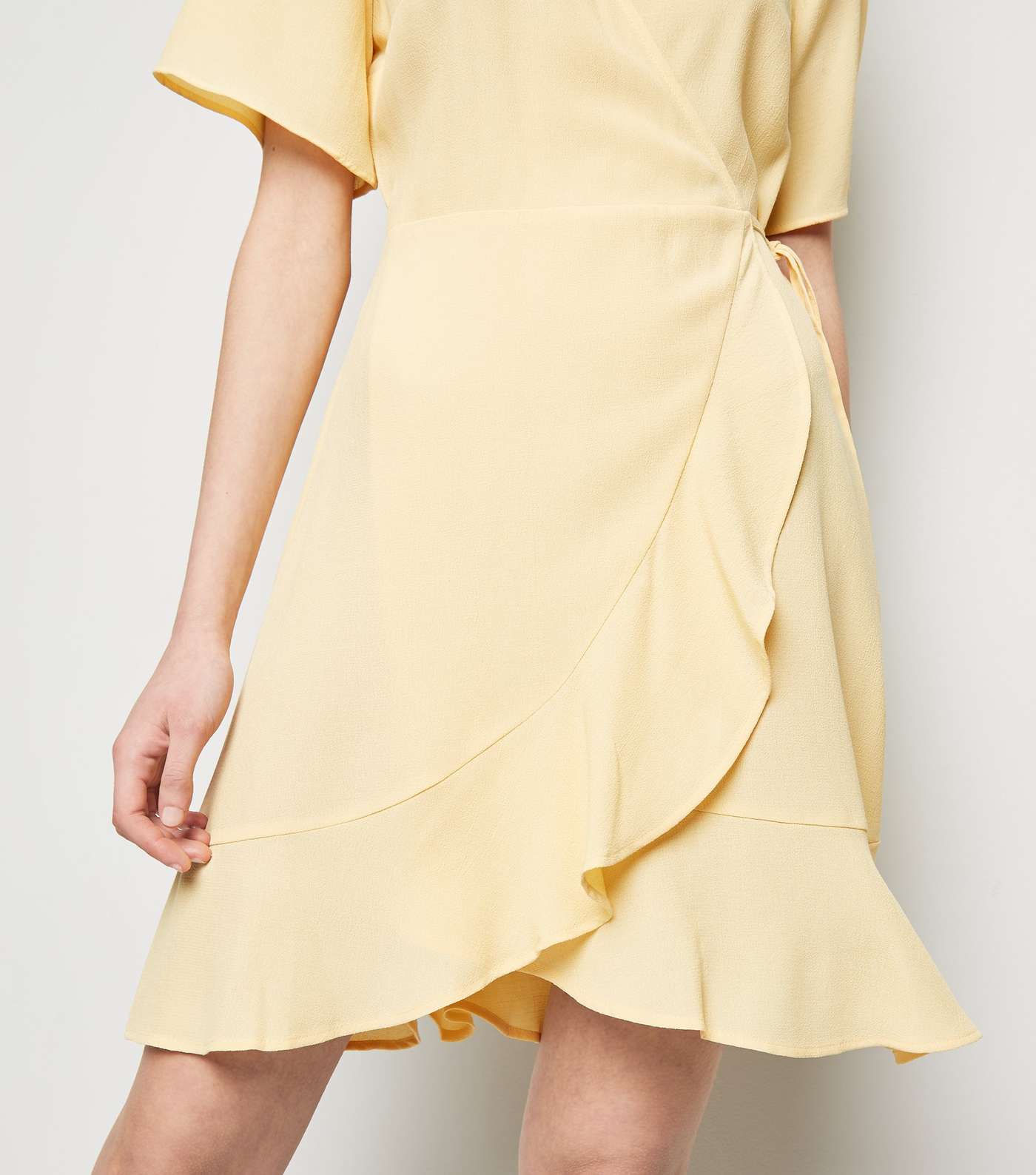 Pale Yellow Ruffle Hem Wrap Mini Dress Image 5