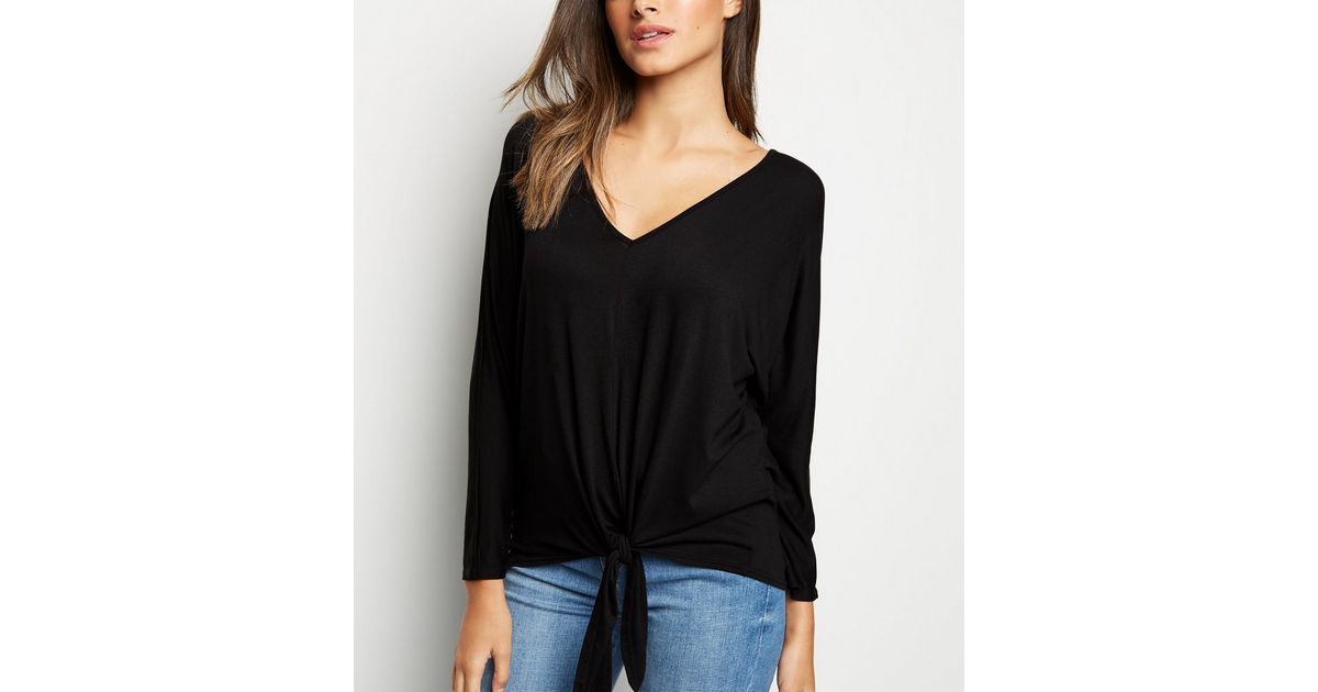 black long sleeve tie front top