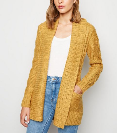 Gilet moutarde en maille torsadée