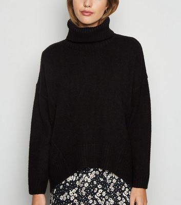 black batwing polo neck jumper