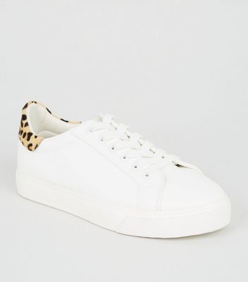 white and leopard print trainers