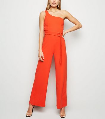 red belted one shoulder jumpsuit