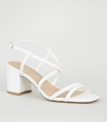 white strappy sandal heels
