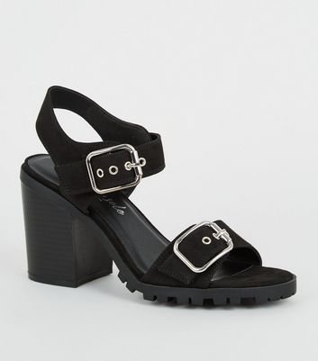 black buckle strap sandals