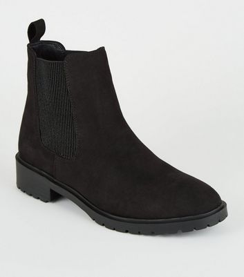 black flat chelsea boots