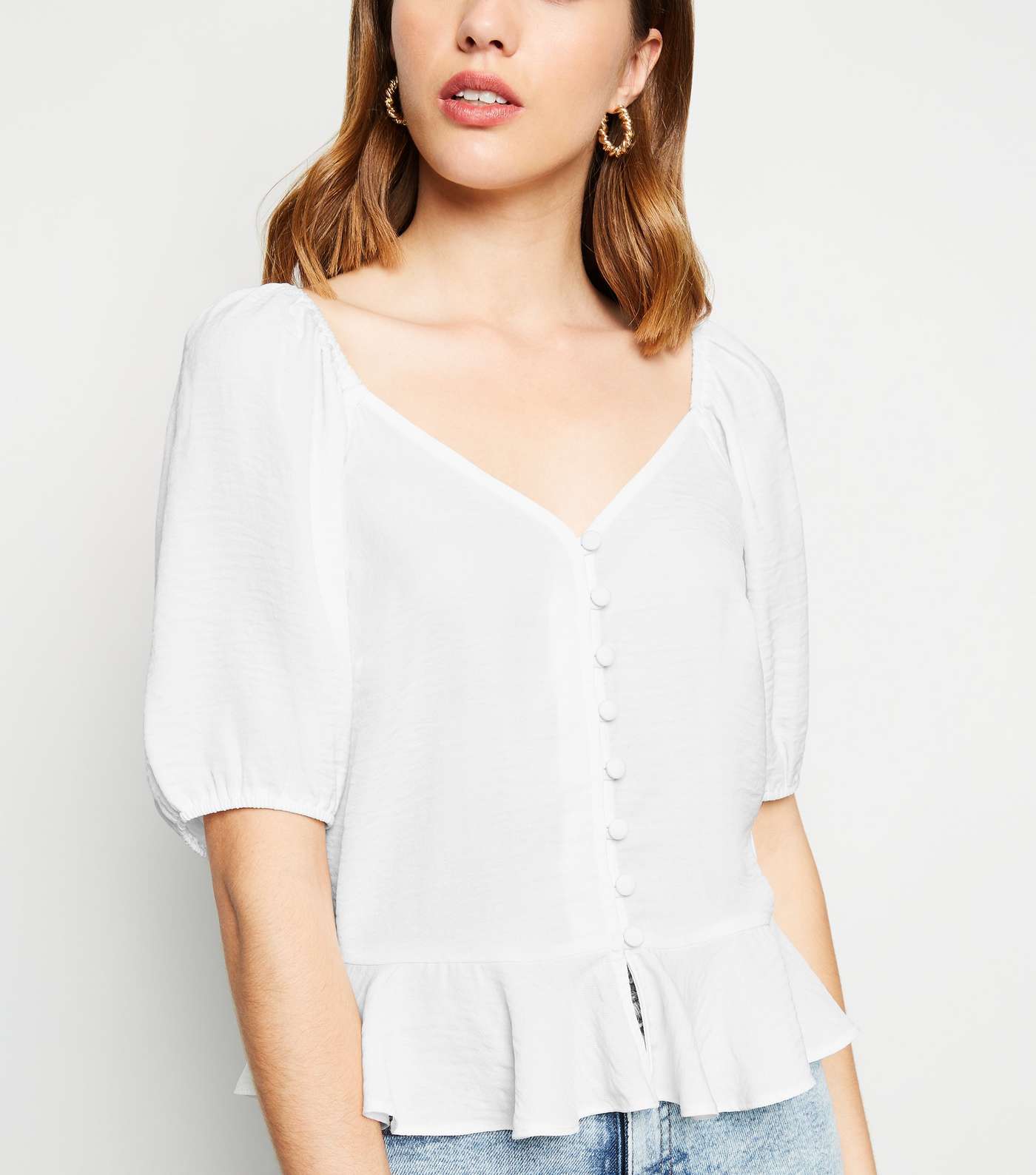 Off White Button Front Peplum Blouse