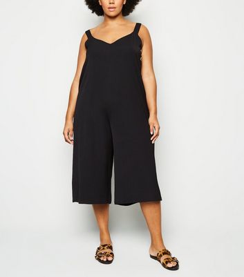 black buttoned jumpsuit