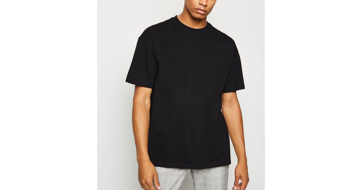 Schwarz Baumwolle Oversize-T-Shirt in New | Look schwerer aus