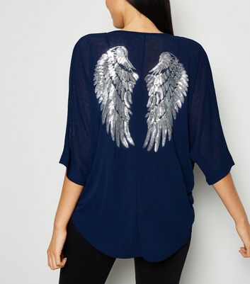 jumper with sequin wings on back