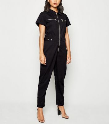 jumpsuit with sweater over