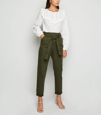 khaki tapered trousers