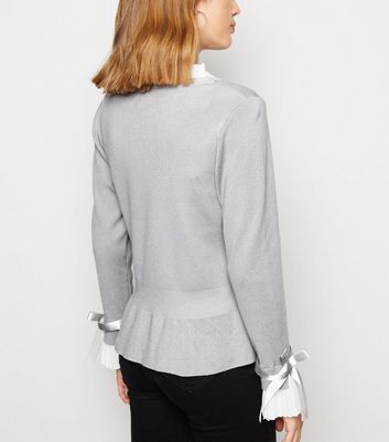 grey frill jumper