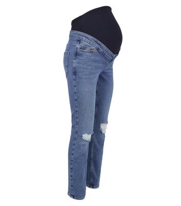 Click to view product details and reviews for Maternity Blue Ripped Over Bump Tori Mom Jeans New Look.