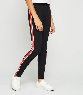 black leggings with yellow stripe down the side