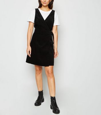 petite black pinafore dress