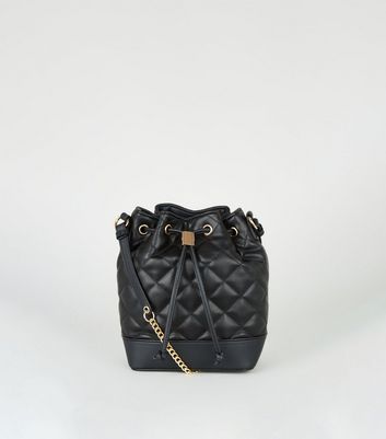 black quilted duffle bag