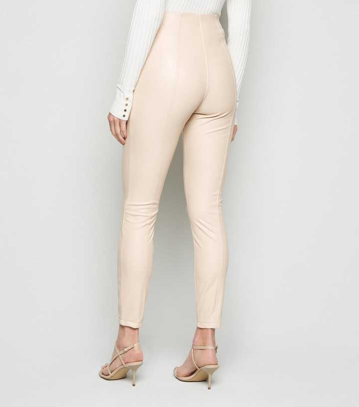 https://media3.newlookassets.com/i/newlook/634018213M2/womens/clothing/leggings/cream-coated-leather-look-leggings.jpg?strip=true&qlt=50&w=720