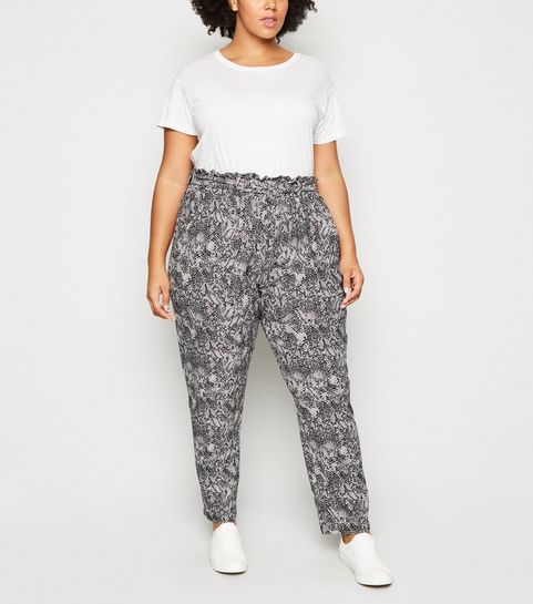 Curves - Jogging noir doux au toucher à imprimé peau de serpent