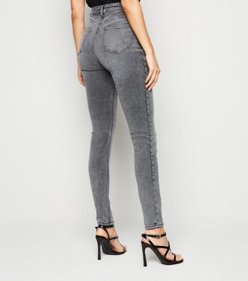 gray high rise skinny jeans