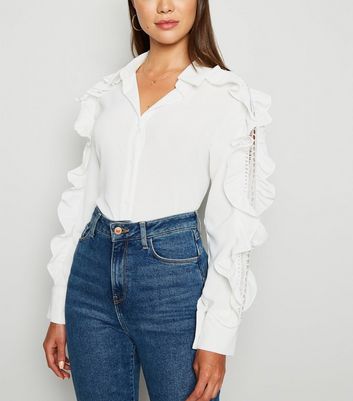 white ruffle sleeve top