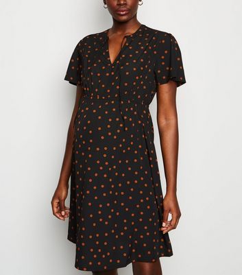 Robe noire best sale à pois