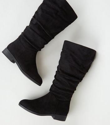 calf length flat black boots