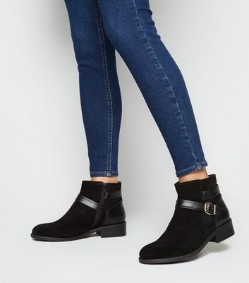 booties with buckles and straps