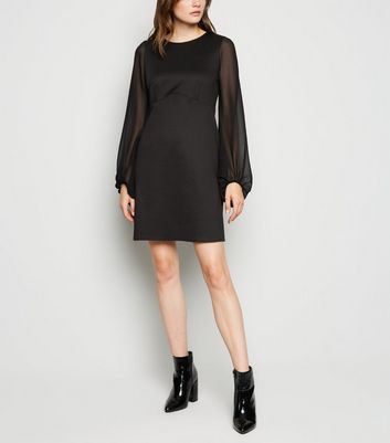 black dress with chiffon sleeves