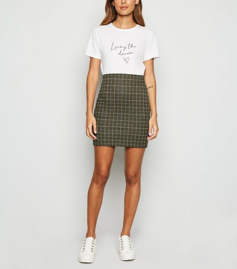 Mini-jupe tube kaki à carreaux