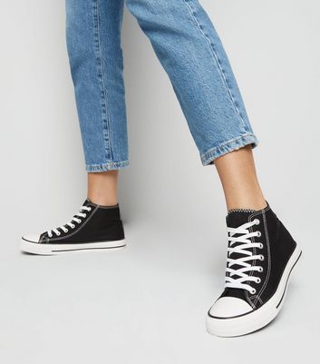 black canvas high top trainers
