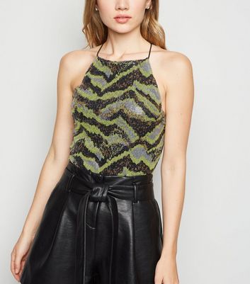 green sequin bodysuit
